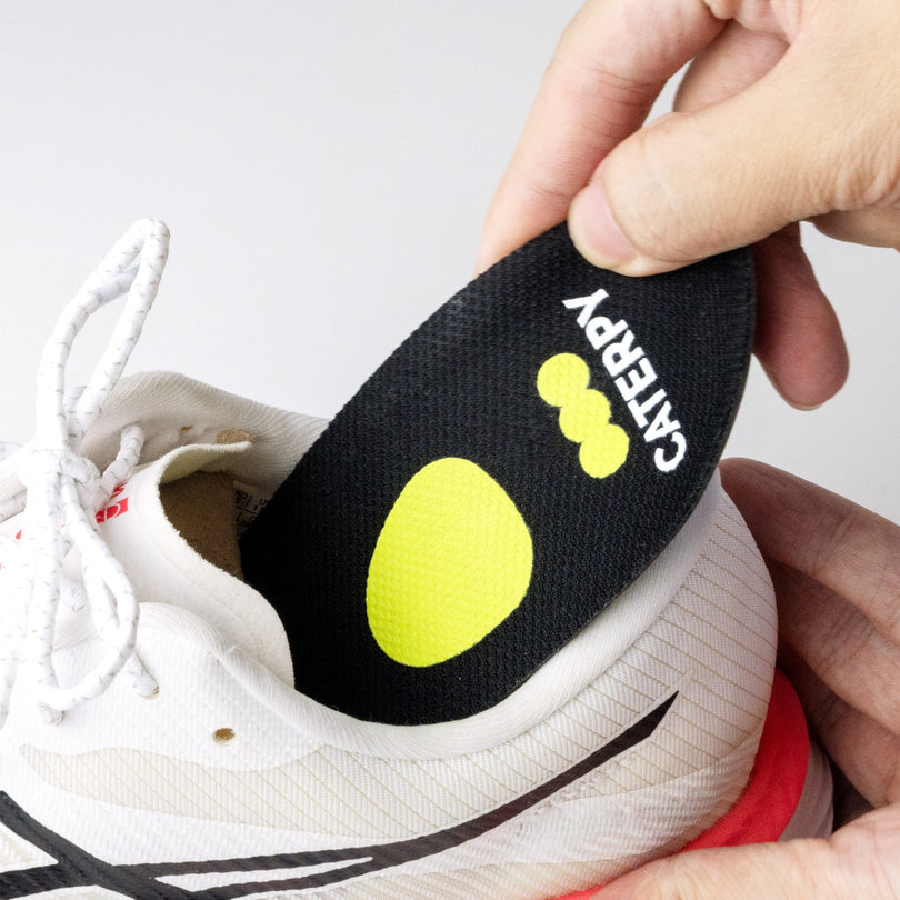 Inserting a Caterpy Cuboid Support Insole into a shoe